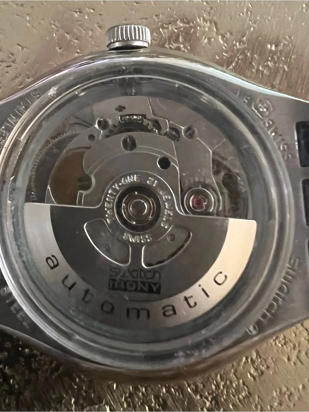 Swatch Silver Case Watch with Black Strap and White Dial